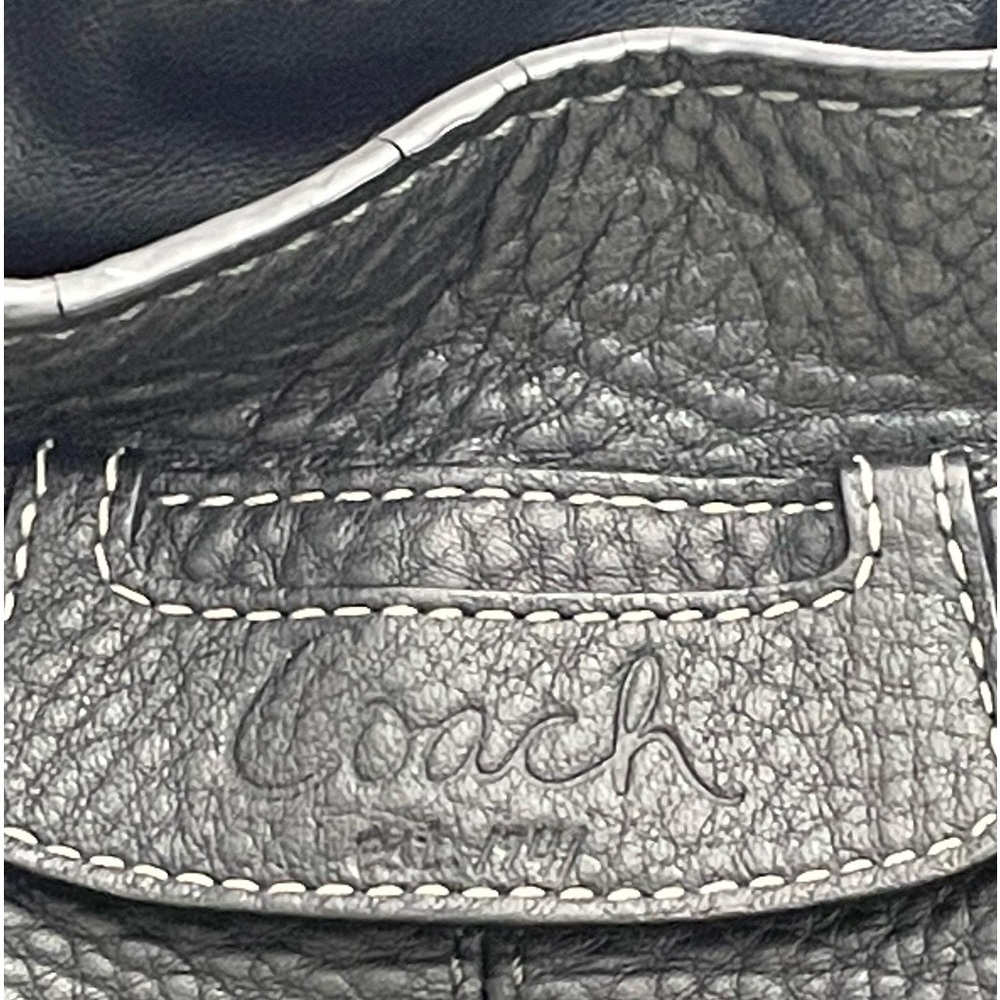 Women’s black coach clutch bag